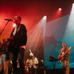 Live band performing at Katoomba Easter Convention with vibrant stage lighting.